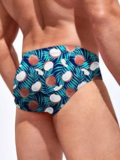 Escape to paradise with our Tropical Print Swim Brief. Embodying the spirit of a tropical getaway, this swim brief features a vibrant and exotic print that transports you to sun-soaked beaches and palm-fringed shores. Made from high-quality, quick-drying fabric, it offers a comfortable and flexible fit for all-day wear. Features: Pattern Type: Fruit & Vegetable Type: Briefs Fabric: Medium Stretch Material: Fabric Care Instructions: Hand wash or professionally dry clean Size Chart ( Inches ): Siz Beachwear Swim Trunks With Tropical Print For Vacation, Tropical Print Swim Trunks For Beach Season, Tropical Swim Trunks For Beach Season, Tropical Print Swim Trunks For Pool And Beach Season, Palm Tree Print Swimwear For Beach Season, Multicolor Palm Tree Print Swimwear For Poolside, Surfing Swim Trunks For Beach Season, Tropical Style Swim Trunks With Tropical Print For Vacation, Tropical Print Swim Trunks For Vacation