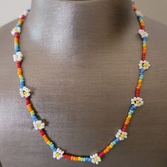 Loft Outlet Necklace Very Pretty Colorful Small Beads & Flowers. Great With Summer Tops & Dresses. White Bohemian Flower Necklace With Round Beads, White Flower Necklace With Tiny Beads For Gift, White Flower Necklace With Colorful Beads, Adjustable White Flower-shaped Beaded Necklaces, Adjustable White Flower Beaded Necklaces, White Beaded Flower Necklace, White Flower Necklace With Tiny Round Beads, White Flower Shaped Beads For Jewelry Making, White Flower Necklace With Colorful Beads For Gift