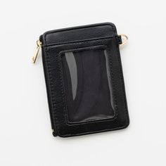 Upgrade your everyday accessory game with the stylish and functional Lauren Wallet. This wallet is crafted from high-quality vegan leather. The Lauren Wallet features a convenient zipper pouch, perfect for securely holding loose change or small items. With four card slots, you'll have plenty of space to keep your essential cards organized and easily accessible. Stay organized and chic with the Lauren Wallet, the perfect companion for any handbag. Wallet Details: Made with Premium Vegan Leather D Trendy Card Holder With Zipper Closure For Everyday Use, Trendy Card Holder With Zipper For Everyday Use, Versatile Card Holder With Zipper Closure, Versatile Bifold Card Holder With Zipper, Versatile Bifold Card Holder With Zipper Closure, Versatile Card Holder With Card Slots For Personal Use, Black Badge Holder With Card Slots For Everyday Use, Black Badge Holders With Card Slots For Everyday Use, Black Badge Holders With Card Slots