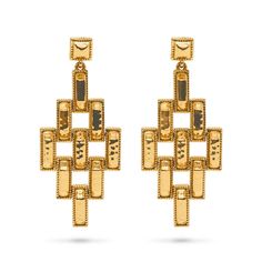 These earrings are constructed of rectangular hammered gold links in a chandelier silhouette with a geometric twist that is simultaneously edgy and elegant. Symbolizing the different pathways we choose to follow in life - each one fabulously unique - wear these as you travel along your daily adventures, from Monday meetings to Saturday date night. Metal Earrings With Rectangular Links, Elegant Hammered Rectangular Earrings, Elegant Rectangular Hammered Earrings, Modern Gold Metal Chandelier Earrings, Gold Hammered Rectangular Earrings, Elegant Rectangular Gold-tone Earrings, Elegant Gold-tone Rectangular Earrings, Elegant Hammered Gold Chandelier Earrings, Rectangular Gold Evening Earrings