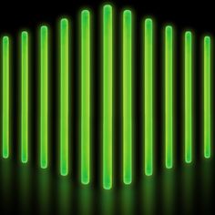 a sound board with neon green lights on it