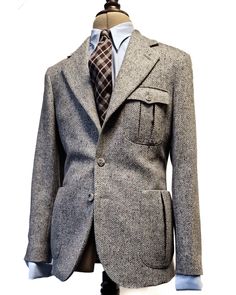 Perhaps the most iconic and versatile Cathcart piece ever produced. The single breasted King Cole suit is a mainstay of the collection, built faithfully from a 1930’s pattern. Customise this Cathcart bestseller to your liking, from lapel style to pocket shapes. Perfect for any event, day or night, wool or linen, and can be worn with either wide or straight leg suit trousers, or even plus-fours as well. Most definitely compatible with either a double breasted or single breasted waistcoat as a three piece, but also consider adding another waistcoat to have a contrast colour in the collection. Luxury Fitted Tweed Sport Coat, Luxury Single Breasted Tweed Sport Coat, Luxury Fitted Tweed Jacket With Welt Pockets, Luxury Fitted Single Breasted Tweed Jacket, Luxury Fitted Single-breasted Tweed Jacket, Tailored Classic Tweed Jacket For Semi-formal Occasions, Luxury Tailored Single-breasted Tweed Jacket, Timeless Fitted Tweed Jacket With Pockets, Luxury Tweed Jacket With Welt Pockets And Lapel Collar