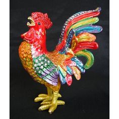 a colorful rooster figurine on a black background