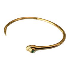 Emerald Head White Diamond Eyes Gold Plated Snake Bracelet Bangle Victorian Style Emeralds are deeply connected to the concept of emotional renewal and recovery. They are thought to have a soothing energy that can calm turbulent emotions and help clear negative thoughts, thereby enhancing emotional equilibrium. This makes emeralds particularly beneficial for those undergoing emotional trauma, as they provide a supportive energy that can help to heal the scars of past experiences and strengthen the heart chakra. By aligning the heart chakra, emeralds facilitate an ability to experience love more deeply and to express compassion more freely. Furthermore, emeralds are believed to enhance mental acuity and focus, making them ideal for decision-making and intellectual pursuits. Their reputed ab Luxury Formal Snake Bracelet, Luxury Adjustable Snake Shape Bracelets, Adjustable Luxury Snake Bracelets, Serpenti Viper Bracelet, Luxury Elegant Snake-shaped Bracelet, Modern Bangle, Coil Bracelet, Yellow Gold Bangle, Modern Bracelets