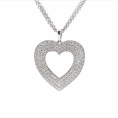 Simple and classic, this white gold heart pendant is a staple for every woman’s wardrobe. It features 114 diamonds that offer enduring sparkle. 1.46ct 114 Diamonds Set in White Gold Luxury Heart Cut Diamond Necklace With Accents, Luxury Diamond White Heart Cut Diamond Necklace, Luxury Heart Cut Diamond Necklace With Single Cuts, Luxury Heart Cut Necklaces With Pave Setting, Dazzling Heart Cut Diamond Necklace With Single Cut Diamonds, Luxury Heart Cut Brilliant Diamond Necklace, Luxury White Gold Heart Cut Diamond Necklace, Luxury Heart Cut Necklace With Pave Setting, Luxury Heart Cut Diamond Necklace With Brilliant Cut