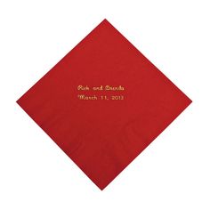 a red napkin with an embroidered label on the front that says, rose and barbara march 11, 2013