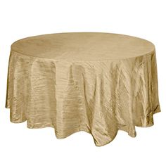 a round table with a gold cloth on it