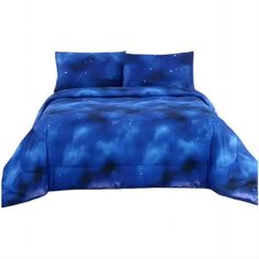 a blue comforter set with stars on it