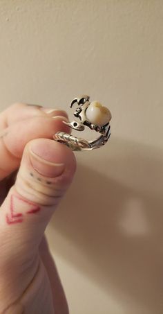 Scorpion thai silver band with baby tooth. Thai silver tarnish less than 925 but is softer. Adjustable.  Options to add a free gem cavity to your molar! Many colors available, please message me! Gap Tooth Jewelry, Human Teeth Jewelry, Tooth Jewellery, Teeth Ring, Character Customization, Tooth Jewelry, Tooth Ring, Human Teeth, Gap Teeth