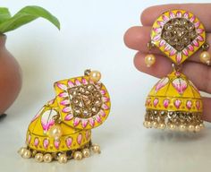 Check out this item in my Etsy shop https://www.etsy.com/listing/882198297/hand-painted-jhumka-indian-earrings Fusion Kundan Jhumkas With Gota Work, Fusion Style Kundan Jhumkas With Gota Work, Fusion Chandbali Jhumkas With Gota Work, Fusion Style Jhumkas For Wedding And Navratri, Fusion Style Wedding Jhumkas For Navratri, Fusion Style Wedding Jhumkas For Festivals, Festive Fusion Gota Work Jhumkas, Fusion Style Festive Jhumkas With Gota Work, Festive Fusion Jhumkas With Gota Work