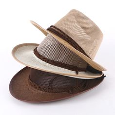 Straw Cowboy Hat – a Western-inspired accessory that brings a touch of rugged charm and laid-back style to your ensemble. Whether you're heading to a country concert, a summer festival, or just want to infuse your look with a bit of cowboy flair, this hat is the perfect choice. Key Characteristics: Classic Cowboy Design: Embrace the iconic and timeless design of the Straw Cowboy Hat. The wide brim, teardrop-shaped crown, and decorative hatband capture the essence of traditional Western style, ad Cowboy Hat Styles, Mens Straw Hats, Cowboy Design, Classic Cowboy, Straw Cowboy Hat, Chapeau Cowboy, Western Cowboy Hats, Seaside Beach, Sun Cap