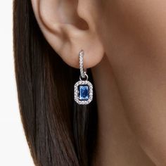 New In Box Millenia Drop Earrings Octagon Cut, Blue, Rhodium Plated Refined And Yet Equally Striking, These Pierced Earrings Guarantee To Spark Conversation. Framed With Elegant White Pav Crystals, This Pair Features A Blue Dancing Stone In The Center And Is Finished With A Rhodium Plated Setting. Wear Yours With Everything From Denim And Tailoring To Your Favorite Evening Looks A Design This Beautiful Deserves To Steal The Spotlight At All Hours. These Earrings Are Part Of The Millenia Family, Blue Halo Design Earrings As Gift, Steal The Spotlight, Swirl Earrings, Crystal Hoop Earrings, Swarovski Necklace, Swarovski Crystal Earrings, Swarovski Earrings, Purple Crystals, Rose Earrings