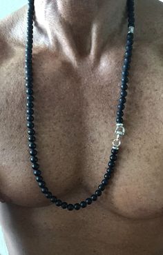 32 inch black Onyx 8mm matte finish bead necklace with silver snaffle bit accent piece Black Jewelry With Sterling Silver Clasp For Everyday, Everyday Black Jewelry With Sterling Silver Clasp, Snaffle Bit, Beaded Necklaces, Bead Necklace, Black Onyx, Accent Pieces, Onyx, Beaded Necklace