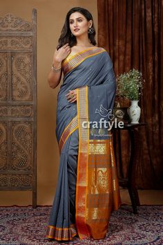 Indulge in the timeless elegance of the Bomkai Silk Saree, also known as Sonepuri Silk. This traditional weave from Odisha features intricate golden zari work, adding a touch of opulence to the Lava Grey color. Crafted in soft silk, this saree is lightweight and comfortable, making it perfect for any occasion. The zari border adds a stunning contrast to the overall design, enhancing its beauty. Each saree comes with a matching blouse piece, ensuring a complete and effortless look. Elevate your ethnic wardrobe with this exquisite Bomkai saree.Saree Length : 5.5 Mtr Blouse Piece Length : 0.8 Mtr Design : Bomkai Fabric : Blended Silk Wash Care : Dry Clean Get this exclusive bomkai soft silk saree online at Craftyle - The best online store for pure silk saree, tussar silk saree and cotton sare Festive Gold Cotton Silk Traditional Wear, Gold Cotton Silk Traditional Wear With Traditional Drape, Gold Paithani Silk Traditional Wear For Eid, Gold Handloom Traditional Wear For Diwali, Traditional Gold Wear With Zari Weaving, Gold Cotton Silk Traditional Wear For Diwali, Bollywood Style Gold Handloom Traditional Wear, Gold Cotton Silk Traditional Wear, Traditional Gold Cotton Silk Wear