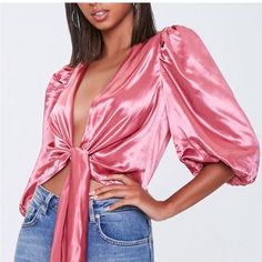 Pink Satin Tie Front Top Never Worn (Can Also Be A Wrap Top As Seen In Pic #2) Spring Crop Top For Going Out, Spring Cropped Satin Blouse, Trendy Satin Top For Date Night, Glamorous V-neck Crop Top For Spring, Glamorous Satin Blouse For Spring, Chic Forever 21 Crop Top For Brunch, Fitted Forever 21 Blouse, Forever 21 V-neck Party Crop Top, Chic V-neck Crop Top Forever 21