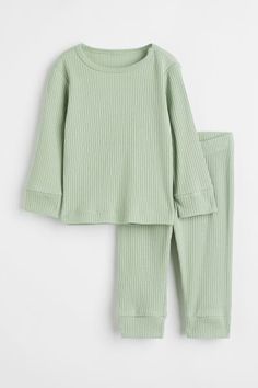 Ribbed Cotton Set - Light green - Kids | H&M US 1 Cotton Sets With Ribbed Cuffs For Spring, Ribbed Spring Sleepwear, Casual Cotton Sets With Ribbed Cuffs, Winter Ribbed Loungewear Sets, Ribbed Loungewear Sets For Winter, Ribbed Long Sleeve Loungewear Sets, Plain Long Sleeve Loungewear Sets, H&m Long Sleeve Tops With Ribbed Cuffs, Stretch Ribbed Long Sleeve Sets