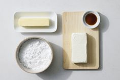 cheese, butter and other ingredients on a cutting board