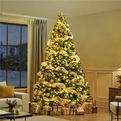 a decorated christmas tree in a living room