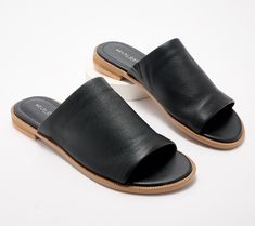 Slide these genuine leather sandals right into your cart! Their modern, minimalistic design makes them your go-to shoe for pairing with everything in your sunny-season closet. From Kelsi Dagger. Modern Flat Footbed Sandals For Spring, Modern Slip-on Sandals For Summer, Sleek Sandals With Cushioned Footbed For Beach, Casual Leather Footbed Sandals With Open Heel, Casual Leather Footbed Sandals For Spring, Casual Leather Open Heel Footbed Sandals, Classic Leather Slides For Spring, Classic Summer Slingback Sandals With Round Toe, Everyday Leather Slingback Sandals With Removable Insole