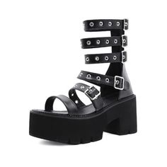 Add a touch of edgy sophistication to your look with our Black Gothic Punk Strappy Platform Sandals. Featuring a chunky platform sole for added height, adjustable buckle closures for a secure fit, and a back zipper closure for easy wear, these sandals combine style and functionality. Made from high-quality black vegan leather, they are perfect for complementing any gothic, punk, rock, or alternative outfit. Step out in style and make a statement with these unique and versatile sandals. Chunky platform sole for added height and style Adjustable buckle closures for a secure fit Back zipper closure for easy on and off Made from high-quality black vegan leather Perfect for gothic, punk, rock, and alternative fashion Platform Sandals With Round Toe For Concert, Round Toe Platform Sandals For Concert, Edgy Spring Sandals With Chunky Platform, Edgy Chunky Platform Sandals For Spring, Trendy Round Toe Sandals For Concert, Edgy Sandals For Spring Streetwear, Edgy Spring Platform Sandals, Punk Style Sandals With Round Toe For Concerts, Punk Sandals With Buckle Closure And Round Toe