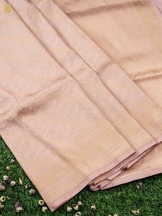 Experience the luxurious elegance of our Katan Silk Tanchoi Sarees, handcrafted with intricate Banarasi designs and premium Katan silk fabric. Available in a range of colors and styles, these sarees are the perfect choice for any special occasion