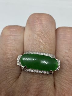 Vintage Lucky Green Nephrite Jade ring Large green nephrite jade Ornate German Silver Vintage ring, does not tarnish, NOT sterling Size 7 only My jeweler can custom re size for a $10-$20 fee All rings are shipped free in the US in a nice gift box. Check out our over a THOUSAND great reviews Engraving is $4 per letter and is not always perfect depending on the piece. It can take a few days if the jeweler is busy. This is payable to Paypal Judithsltd@gmail.com Oval Green Diamond Ring With Vs Clarity, Jade Color, Lucky Green, Nephrite Jade, Vintage Rainbow, Jade Ring, Rings Cool, German Silver, Vintage Ring