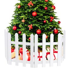 a white picket fence with a christmas tree in the center and presents under it, on a white background