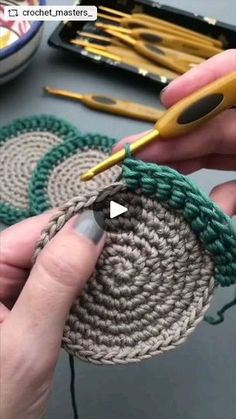 someone is crocheting circles with scissors and yarn