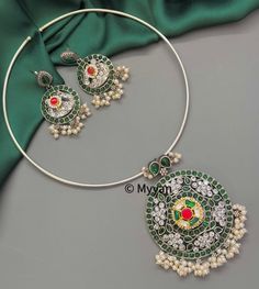 Emerald green Antique silver fusion wire hasli necklace set with pachi kundan and pearl details. Inspire your style with this trendy Indian oxidized necklace set.  All orders Ship same day if placed before 4:00 PM EST  Earring Length: 2.5 inch Earring width: 1.2  inch Necklace length: Adjustable length with dori closure  Create beautiful memory for any occasion with elegant jewelry for your loved ones We will be happy to navigate you through the process so if you have any questions regarding our product before placing an order reach out to us and we will be there to help you.  Thank you for your visit and support Hasli Necklace, Green Antique, Oxidized Necklace, Silver Jewellery Indian, Pearl Details, Necklace Indian, Elegant Jewelry, Necklace Length, Necklace Silver