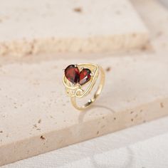 Gorgeous vintage-inspired natural garnet engagement ring, a stunning piece of jewelry perfect for all occasions. Handmade with care and attention to detail, this ring is made to order in Canada and ships from a small business. You have the option to choose between sterling silver or solid gold when crafting this ring and features a beautiful natural garnet stone. ►RING DETAILS: ✦Material: 925 sterling silver, Solid 10k/14K/18K GOLD (can be made in white/rose/yellow gold) ✦Band Width:  2 mm ✦Main Stone: 2 Natural Garnet ，6X8 mm Pear Shaped （1.4CT），5X7 mm Pear Shaped （0.8CT） ✦Accented stones ：None  ►Processing Time and Shipping: This ring is a made-to-order item and requires 2-3 weeks of processing time after payment is received. But don't worry; it'll be worth the wait. The ring is shipped Garnet Birthstone Ring With Accent Stones As Gift, Ruby Ring For Valentine's Day, Birthstone, Classic Garnet Birthstone Ring For Wedding, Formal Ruby Heart Ring With Gemstone, Classic Wedding Birthstone Ring With Garnet, Garnet Ruby Ring Gift, Heirloom Garnet Birthstone Ring For Promise, Heirloom Garnet Birthstone Ring For Anniversary, Garnet Birthstone Promise Rings