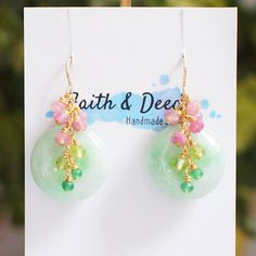 >> Like my design? Follow me on Instagram to stay updated on new design and watch  product video! << http://instagram.com/faithanddeedsjewelry Sweet and elegant. These beautiful earrings are made with Type A Burmese jade donuts in light green colour, dressed with a simple gem clusters of pink tourmaline, peridot and green chalcedony that flows gracefully from top of the jade to create a very refreshing floral feel. A simple yet elegant design that can enhance your daily look instantly. Jade donu Gift Green 14k Gold Filled Earrings, Handmade Green 14k Gold Filled Earrings, Wire Jigs, Gem Cluster, Donut Earrings, Beach Jewelry Boho, Donuts Earrings, Burmese Jade, Tourmaline Earrings