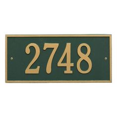 a black and gold address plaque with the number 278