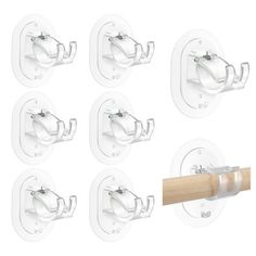 six white wall mounted toilet paper holders with wooden handle and clips on each side, set of 6