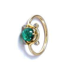 -PRODUCT TYPE - GOLD EMERALD WITH DIAMONDS RING -MATERIAL - GOLD -PURITY - 18K -DIAMOND - 0.07 - APPROX CARAT -STONE - EMERALD - 1.1 - APPROX CARAT -TOTAL WEIGHT - 2.5 - APPROX GRAMS -GOLD WEIGHT - 2.2 - APPROX GRAMS - This piece signifies simplicity that itself is sign of class. Here, we present the essence of diamond with mesmerizing emerald stone. We bet you will love it! -Quality is guaranteed. Our mission is always to satisfy our customers with our offerings, so just relax and place order! Yellow Gold Emerald Cluster Ring With Center Stone, Gold Emerald Cluster Ring With Brilliant Cut, Yellow Gold Halo Ring With Emerald, Yellow Gold Emerald Halo Ring With Round Cut, 14k Gold Rings With Brilliant Cut May Birthstone, 14k Gold Brilliant Cut Ring For May Birthstone, Emerald Ring With Prong Setting In Round Cut, 14k Gold Ring With Center Stone, Emerald Rings With Prong Setting And Round Cut