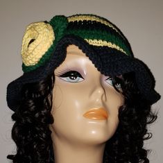 Woman's Crochet Cotton Bucket Hat With Island Colors (Green, Black, And Yellow) With Accent Yellow Crochet Flower. 100% Cotton. Black Adjustable Crochet Hat, One Size Black Crochet Hat For Spring, Black Crochet Beanie For Spring, Adjustable Black Crochet Hat, Black Crochet Adjustable Hat, Black Crochet Hat With Adjustable Fit, Black Crochet Hat Adjustable Fit, Black Crochet Hat Adjustable, Adjustable Black Crochet Hat With Short Brim