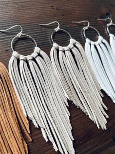 Adjustable Bohemian Earrings For Parties, Trendy Dangle Hoop Earrings For Festivals, Bohemian Silver Fringe Earrings, Silver Fringe Bohemian Earrings, Silver Bohemian Fringe Earrings, Trendy Festival Drop Earrings, Trendy Festival Earrings With Ear Wire, Trendy Single Earring For Festivals, Bohemian Tassel Earrings With Ear Wire For Party