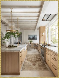 a large kitchen with wooden cabinets and marble counter tops, along with an area rug on the floor