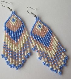 two pairs of beaded earrings with blue and white beads