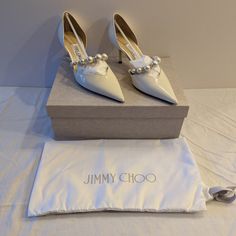 Jimmy Choo - Aurelie 65 - Latte/White New In Box, Never Worn, With All Labels, Packaging And Dust Bag Women's Size 7 Us / 37 Eu Designer Pointed Toe Wedding Shoes, Luxury White Wedding Shoes, Luxury White Wedding Shoes For Formal Occasions, Designer White Round Toe Wedding Shoes, Designer White Wedding Shoes With Round Toe, Designer High Heel White Wedding Shoes, Designer White High Heel Wedding Shoes, Luxury White High Heel Wedding Shoes, Chic White Leather Wedding Shoes