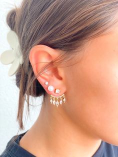 These crystal ear jackets are so cool! They have rhinestones and gold hardware. We love the dangle rhinestone detail too. Jacket Earrings, Ear Jacket Earring, Earring Jackets, Ear Jacket, We Are Love, Instagram Bio, Tiger Lily, Great Hair, So Cool