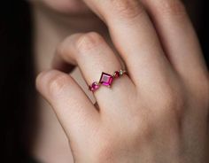 Pink Tourmaline Rings With Gemstone Accents, Pink Lab-created Ruby Ring, Modern Pink Promise Ring, Modern Pink Gemstone Rings, Modern Pink Ruby Ring For Anniversary, Pink Lab-created Ruby Jewelry With Accent Stones, Pink Lab-created Ruby Promise Ring, Modern Pink Ruby Ring For Gift, Modern Pink Ruby Ring As A Gift