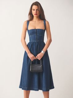 Try not to play favorites.  Shop the Tagliatelle Denim Midi Dress from Reformation, a midi length dress with a corset detailed bodice and lace neckline. Looks Jeans, Denim Midi Dress, Reformation Dress, Swimwear Dress, Lace Neckline, Vintage Inspired Dresses, Midi Length Dress, Linen Clothes, Looks Vintage