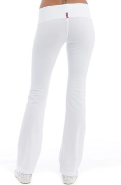 Description: Full length pant Inseam 32" for medium Bootleg cut Fitted, with soft flare at bottom Pre-shrunk Gusset Adjustable roll down waistband, wear high or low Soft elastic-free waistband, prevents pinching Reinforced front and back seam, for durability White color Made in the USA Fabric: 90% Cotton, 10% Lycra.Care: Machine wash in cool, tumble dry low Bootleg Pants, Cheap Brands, Yoga Workouts, Flare Pant, Yoga Clothing, Best Stretches, Long I, Pretty Style, Halle