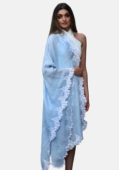 This wispy powder blue scarf, woven from a linen and modal blend, features a contrasting ivory bold scalloped edging lace border. A chic and fashionable add-on to any casual outfit. Bohemian Blue Dupatta For Spring, Elegant Blue Dupatta For Spring, Blue Summer Dupatta, Summer White Silk Dupatta, Blue Dupatta For Summer, White Organza Dupatta For Summer, Blue Dupatta For Spring Wedding, Blue Spring Wedding Dupatta, Blue Wedding Dupatta For Spring