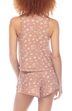 Streamline your evening routine with this supersoft jersey pajama set featuring a slightly-cropped tank and matching drawstring shorts. 20" top length; 3" inseam; 29" leg opening; 12" front rise; 15" back rise (size Medium) Top has crewneck; sleeveless Shorts have elastic/drawstring waist 63% polyester, 33% rayon, 4% spandex Machine wash, dry flat Imported Casual Sleeveless Top For Pajama Party, Comfortable Tank Top For Loungewear, Casual Sleeveless Tank Top For Pajama Party, Comfortable Summer Tank Top For Lounging, Comfortable Sleeveless Sleep Tops, Summer Loungewear Top Short Length, Short Length Summer Loungewear Top, Casual Sleeveless Sleepwear For Loungewear, Casual Short Tank Top For Loungewear