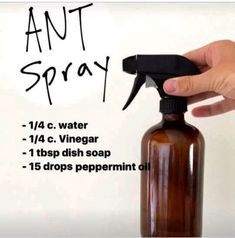 a hand holding a brown spray bottle with an anti - spray label on it and instructions for how to use it