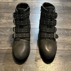 Yoki Boots Sz 8.5 Nwot. All Man Made Materials. Features Side Zipper. Heel Height Is 1 1/2”. Gray In Color. Each Boot Has 4 Silver Tone Buckles And Silver Tone Studs. These Boots Have Never Been Worn. Just Tried On. They Are Beautiful And Definitely Eye Catching. Synthetic Boots With Buckle Closure Medium Width, Edgy Boots With Grommets And Round Toe, Edgy Synthetic Boots With Buckle Closure, Medium Width Synthetic Boots With Buckle Closure, Edgy Heeled Boots With Round Toe, Fall Moto Boots With Grommets And Round Toe, Ankle-high Synthetic Boots With Buckle Closure, Edgy Heeled Boots With Buckle Closure And Round Toe, Heeled Boots With Buckle Closure And Round Toe