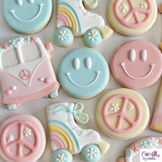 some decorated cookies are laying on a table