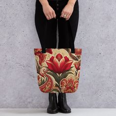 Embrace the charm of spring with our Tulip-Paisley Fusion: Tote Bag. This tote bag is a beautiful amalgamation of nature's elegance and bohemian aesthetics. The design showcases a delightful array of tulips mingling with intricate paisley motifs, creating a Spring Bloom that's sure to catch eyes. Whether you're out for shopping or a day at the beach, our Boho Elegance: Tulip and Paisley Tote Bag is the perfect companion to carry your essentials in style. A spacious and trendy tote bag to help you carry around everything that matters. * 100% spun polyester fabric * Bag size: 15″ × 15″ (38.1 × 38.1 cm) * Capacity: 2.6 US gal (10 l) * Maximum weight limit: 44lbs (20 kg) * Dual handles made from 100% natural cotton bull denim * Handle length 11.8″ (30 cm), width 1″ (2.5 cm) * The handles can s Multicolor Rectangular Bag With Paisley Print, Everyday Use Bags With Paisley Print, Elegant Floral Print Bag For Everyday Use, Red Floral Print Travel Bag, Elegant Floral Print Tote Bag, Elegant Red Bags With Floral Print, Elegant Red Floral Print Bags, Red Floral Print Rectangular Bag, Red Floral Print Tote Bag