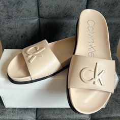 Brand New With Box Real Leather Calvin Klein Slides, Yellow Slides, Silver Slippers, Calvin Klein Models, White Slippers, Wedge Flip Flops, Calvin Klein Shoes, Calvin Klein Women, Calvin Klein Woman